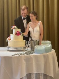 Wedding couple cake cutting